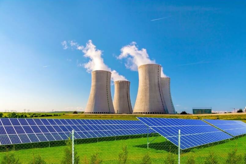 solar panel array located near a power station